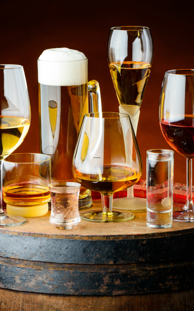 An assortment of glassware including wine glasses, beer mugs, and shot glasses, perfect for completing your crockery set.
