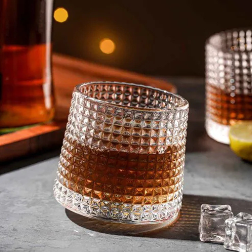 Crystal whiskey glass with a textured diamond pattern, perfect for enjoying your favorite spirits.
